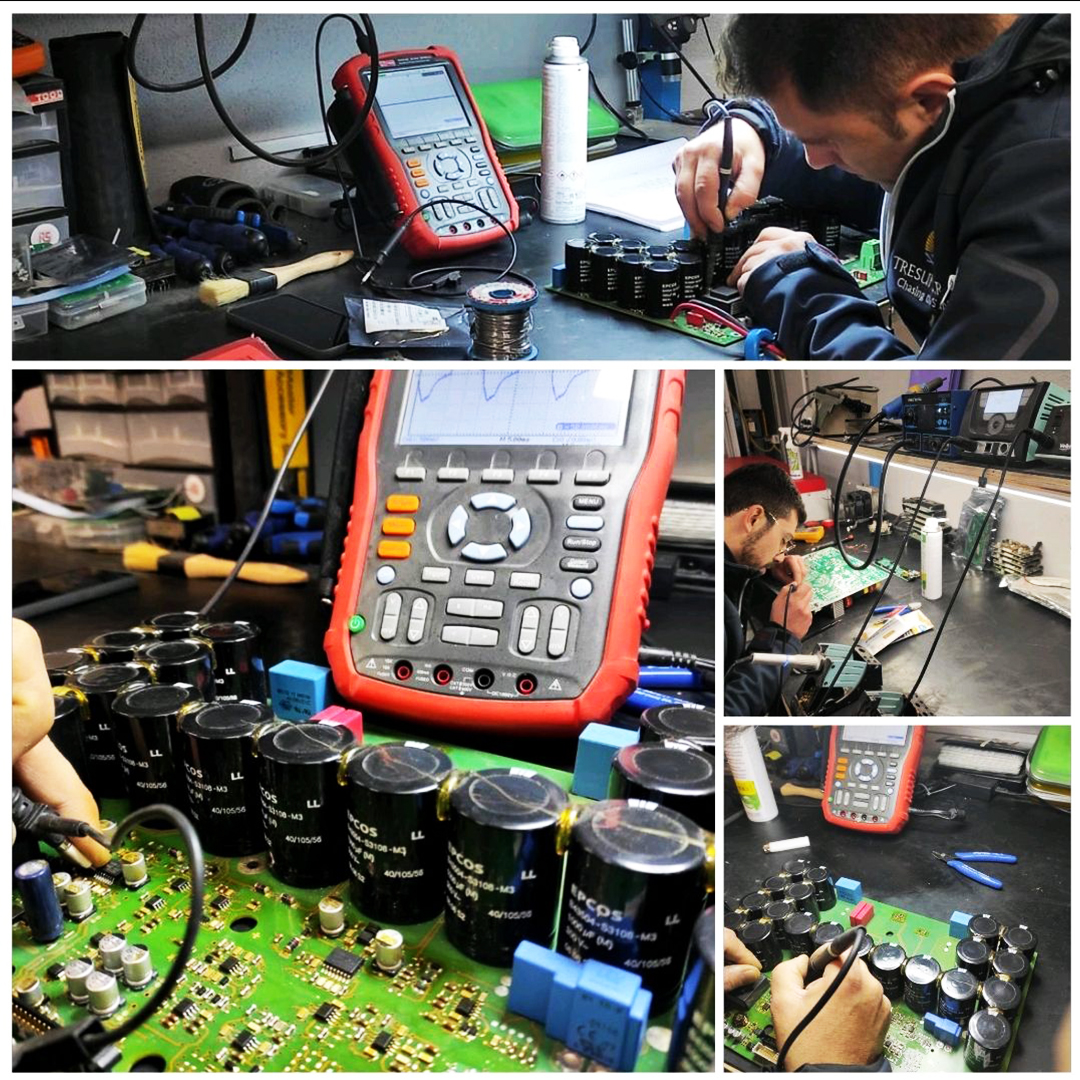 Tecnici Tresun mentre riparano una scheda elettronica nei laboratori di elettromeccanica siti in Sicilia